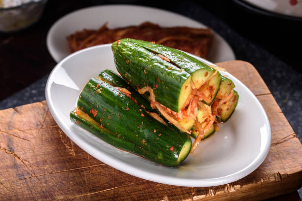 Cucumber Kimchi in a white plate.