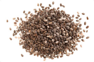 A pile of chia seeds, isolated on white. chia seed is also superfood for gut health